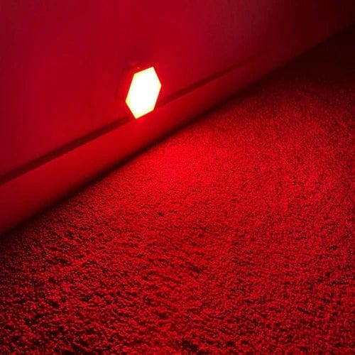 Close-up of a red night light in hallway