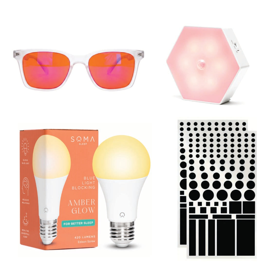 red night light, blackout stickers, glasses and light bulb on a white background.