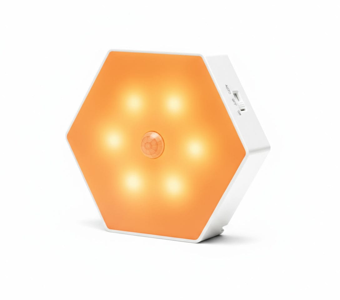 Hexagonal orange light with white base on a white background