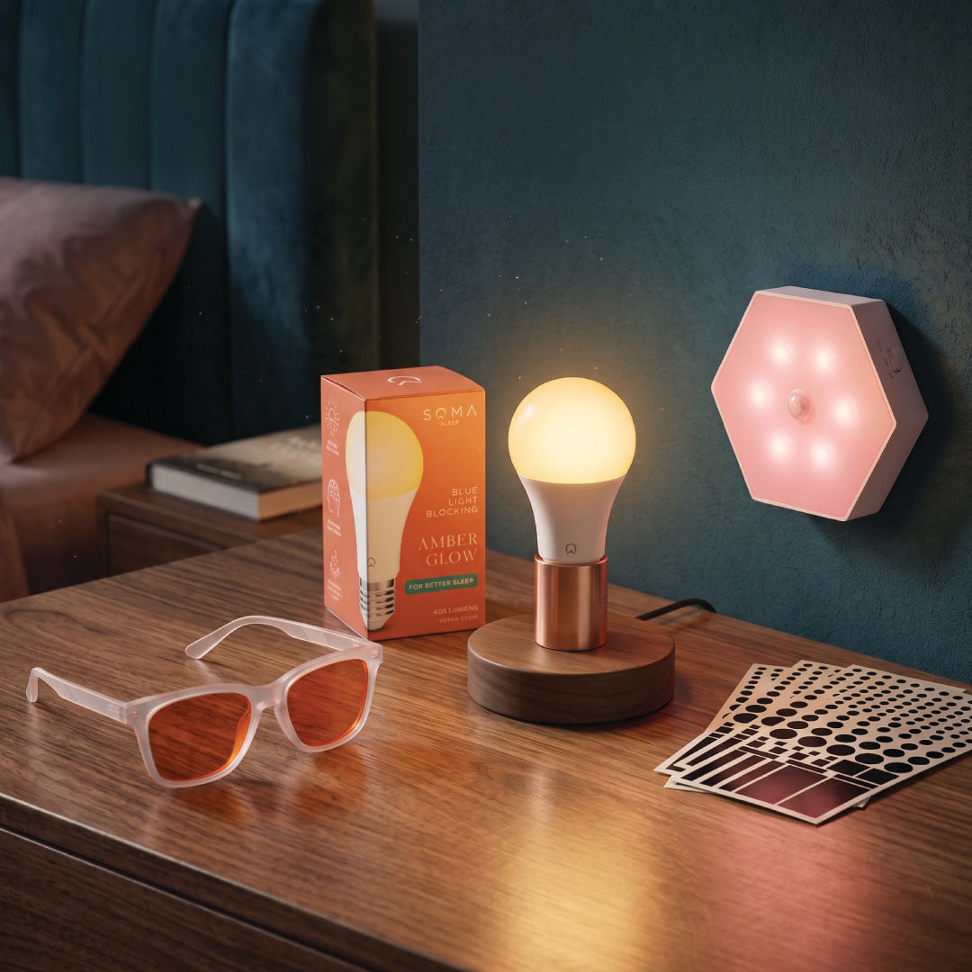 glasses, light bulb, night light, stickers on bedside table.