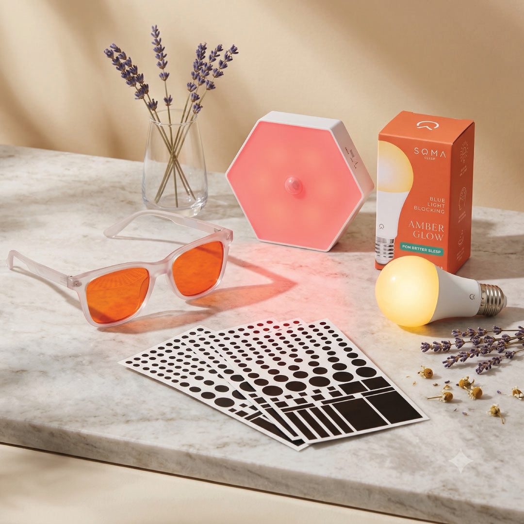 collection of sleep lights on marble with glasses
